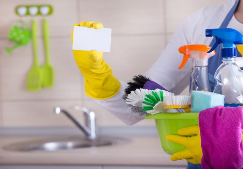 Professional Airbnb cleaner preparing a Clapham short-let apartment for guest arrival